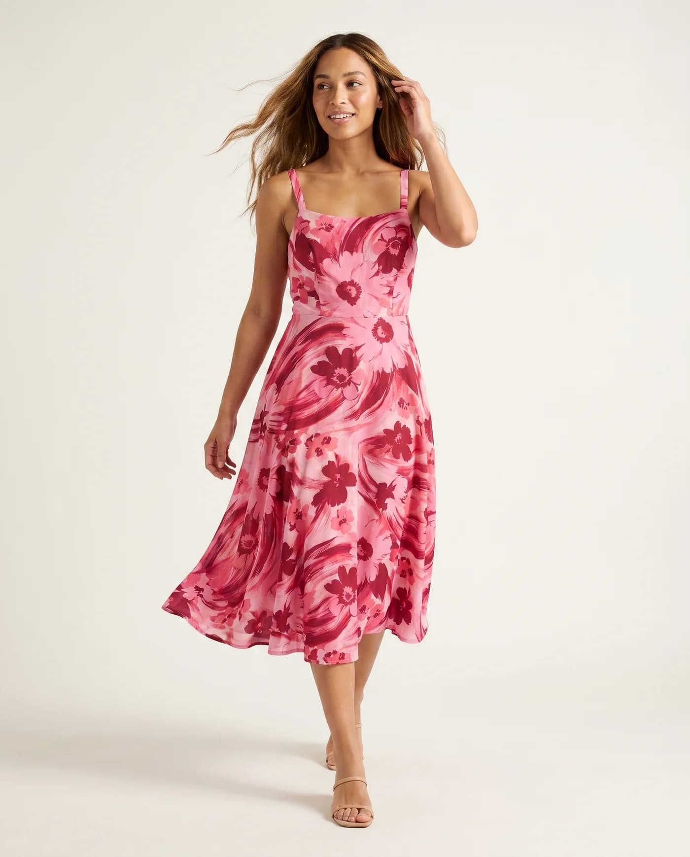 On-model output for Pink floral midi dress