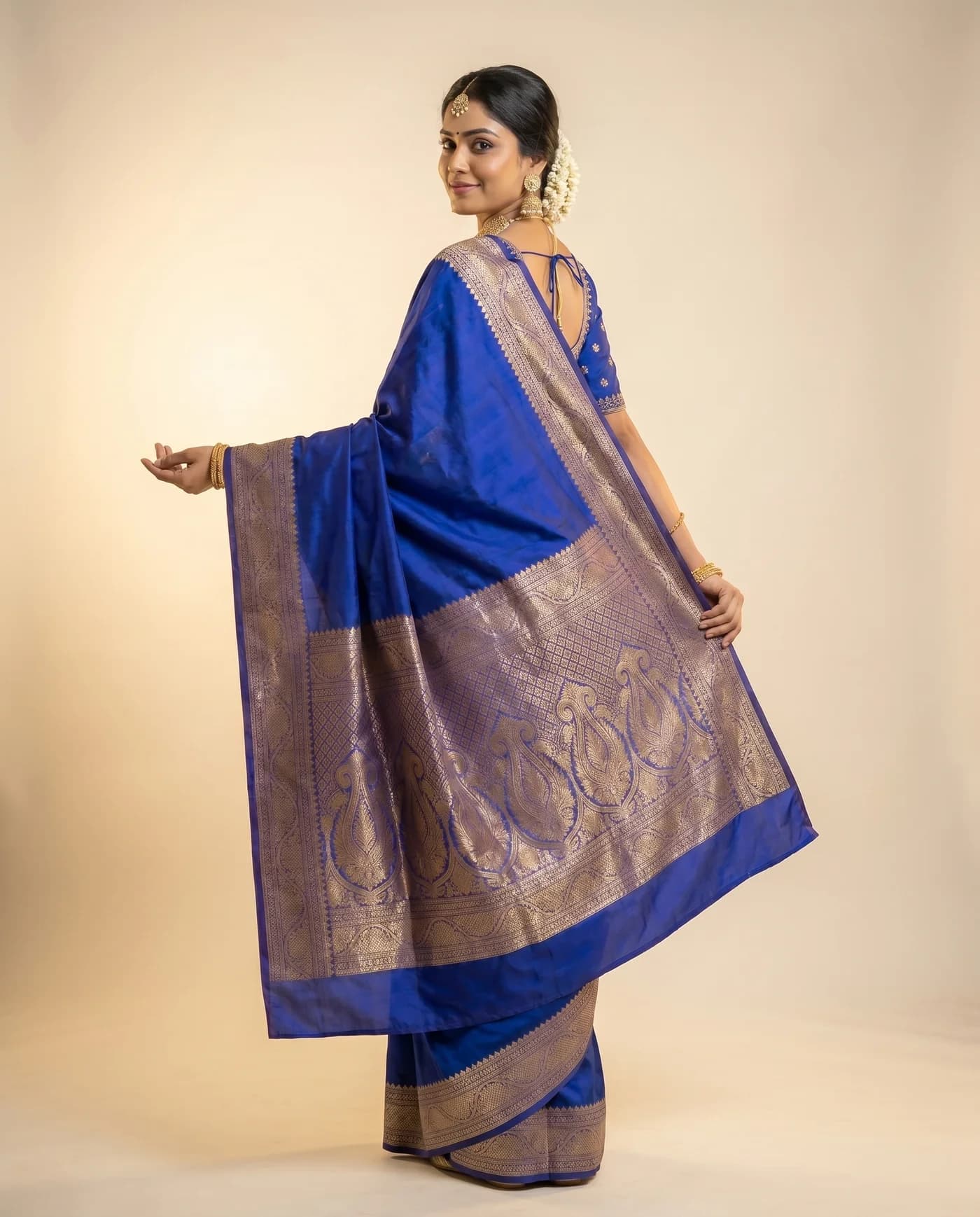 Three-quarter back shot of Royal-blue Banarasi silk saree