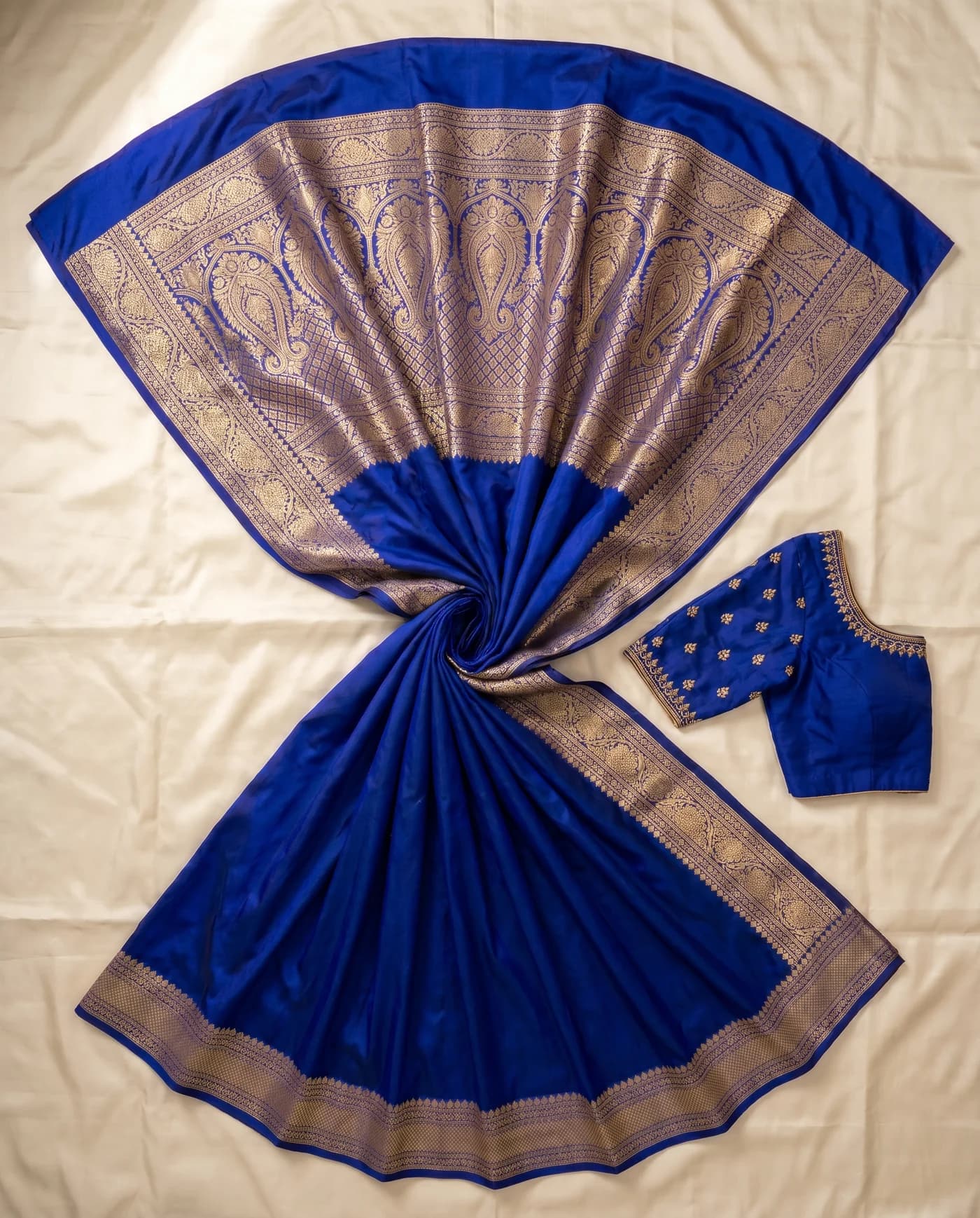 Flat-lay packshot of Royal-blue Banarasi silk saree
