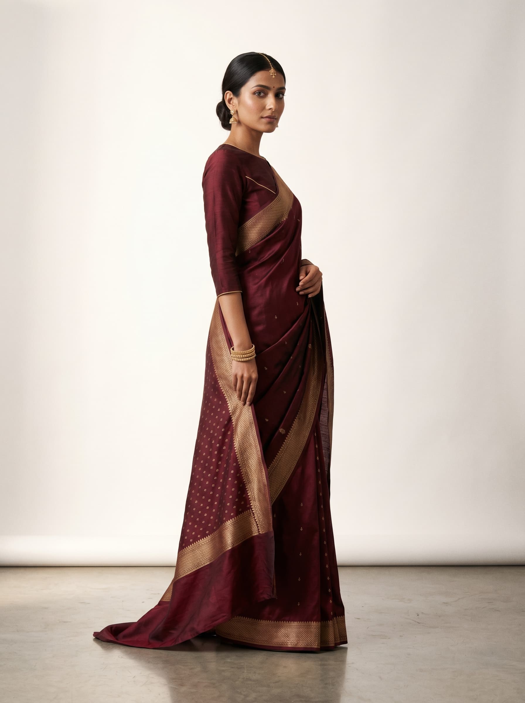 Nykaa Fashion product photo — premium 3:4 portrait on-model render of an India-presenting model in a silk saree with editorial-toned lighting and beauty-adjacent styling at 1500×2000 px